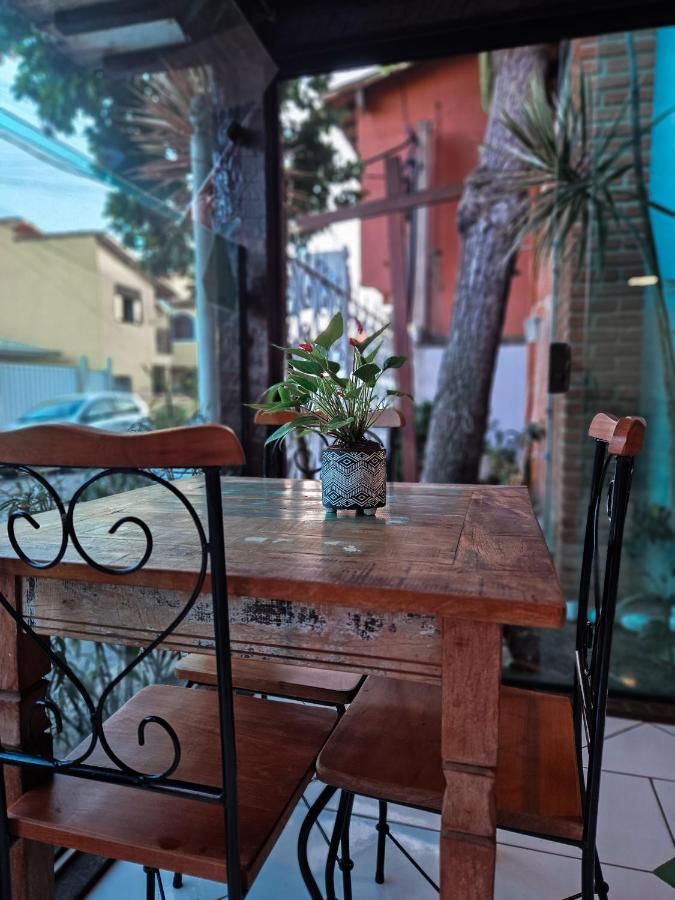 Bliss Hoteis Centro Búzios 외부 사진 A table and chair